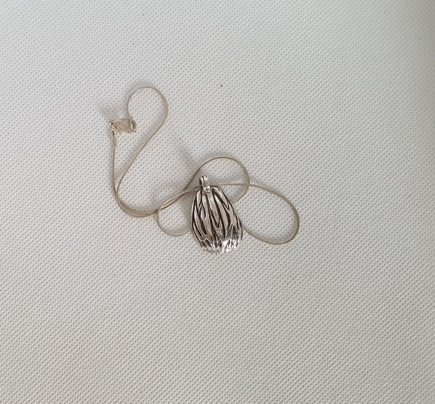 Domed Palm Seed Pendant