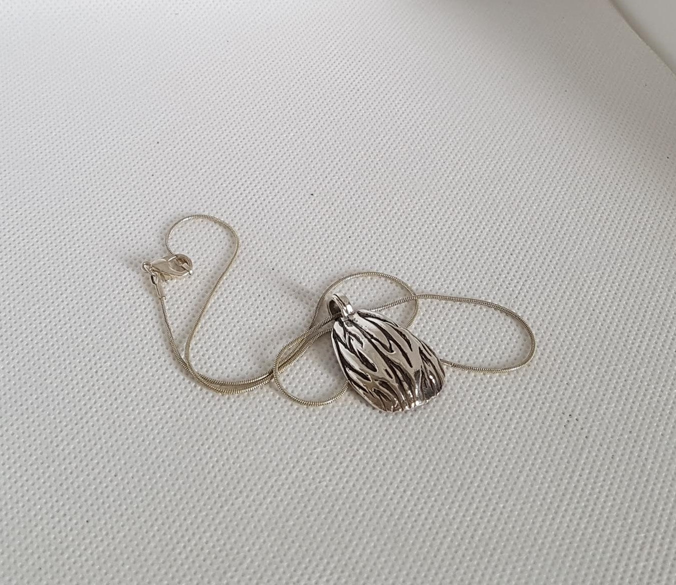 Domed Palm Seed Pendant