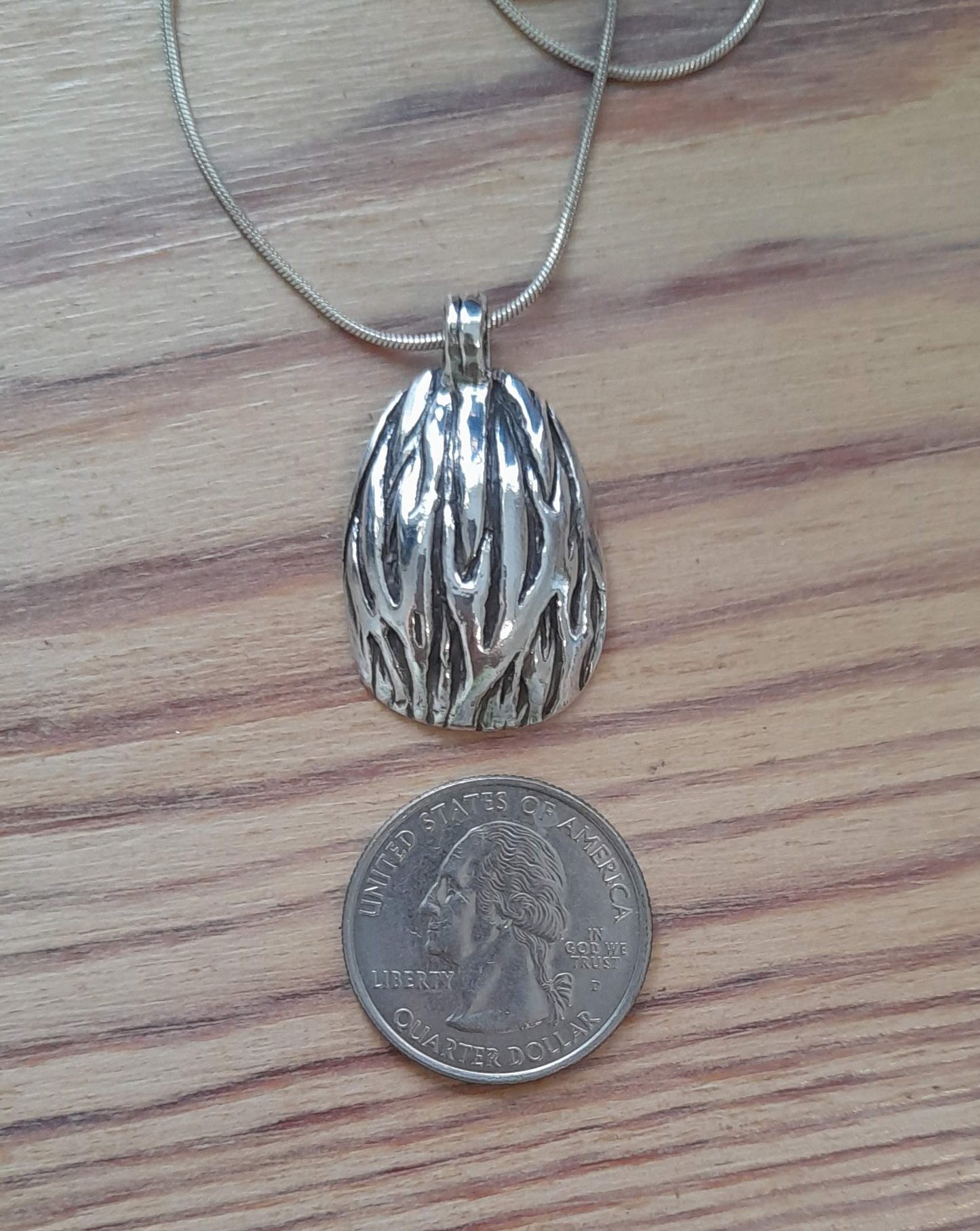 Domed Palm Seed Pendant
